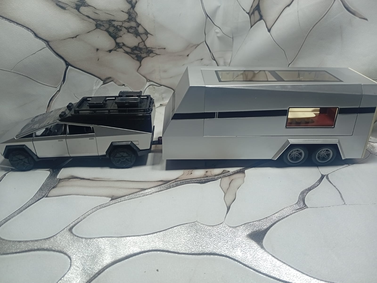 1:24 Scale Tesla Cyber Truck Toy Set with Van, Truck, Bike, Doll & Charging Station – Light & Sound, Opening Doors